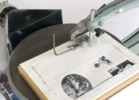 The book stack, loaded onto the saw