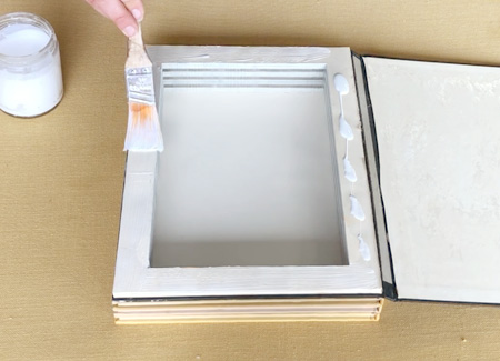 Gluing the cover to the bottom of the stack