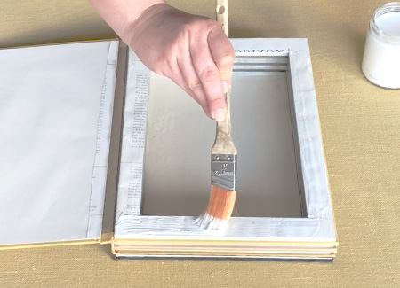 Painting glue on the top of the pages