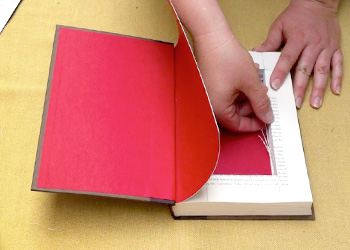 Cleaning up the leftover paper bits