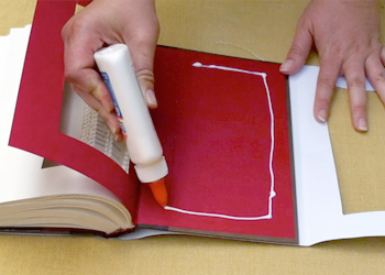 Putting down glue for the dust jacket flap
