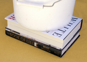 Weighing the book down