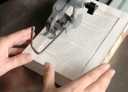 Letting the blade center the book