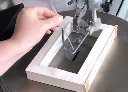 Taking the book out of the saw