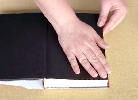 Pressing the endpaper down