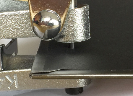 Punching holes in the cover
